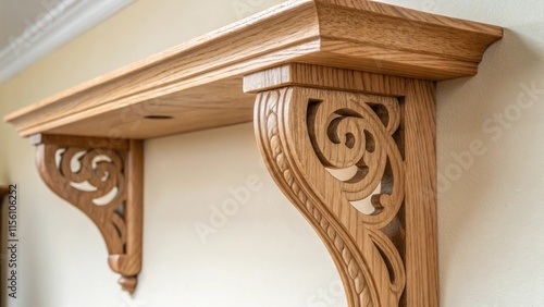 An upclose shot of an artisancrafted wood shelf bracket p against the background of an untouched wall showcasing the precision and detail of the craftsmanship. photo