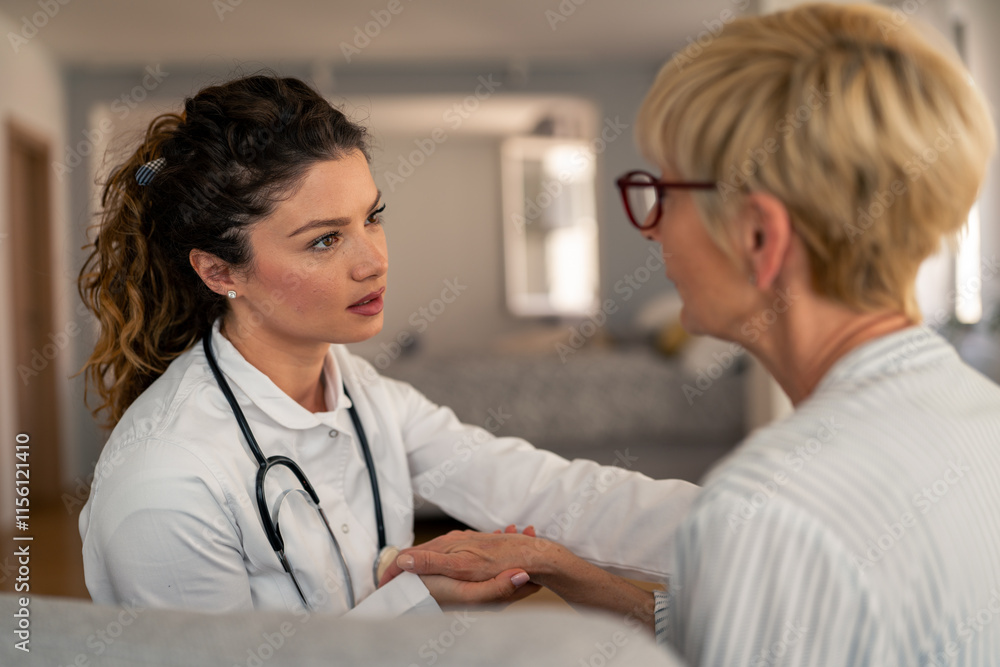 Fototapeta premium Female Caucasian physician in white coat conducts medical consultation with senior patient at residential setting, demonstrating professional healthcare support.