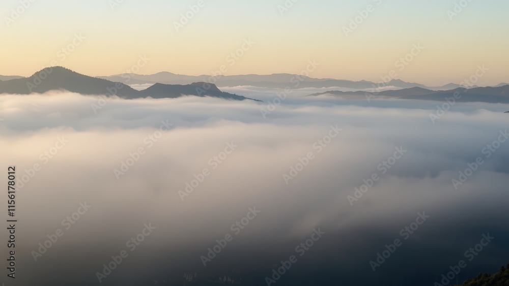 Sunrise Majesty: Mountain Peaks Emerging from a Sea of Clouds Sunrise Majesty: Mountain Peaks Emerging from a Sea of Clouds