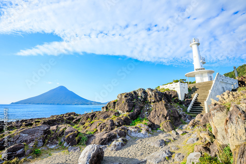 秋の薩摩長崎鼻灯台と開聞岳　鹿児島県指宿市　Satsuma Nagasakibana Lighthouse and Mt.Kaimondake in autumn. Kagoshima Pref, Ibusuki City. photo