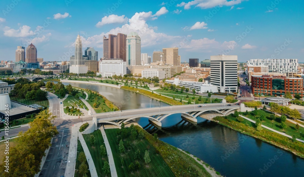 High-angle view of downtown Columbus, Ohio, showcasing the Scioto River and surrounding parks. Modern architecture and urban landscaping blend harmoniously. DOWNTOWN, COLUMBUS, OHIO, UNITED STATES High-angle view of downtown Columbus, Ohio, showcasing the Scioto River and surrounding parks. Modern architecture and urban landscaping blend harmoniously. DOWNTOWN, COLUMBUS, OHIO, UNITED STATES
