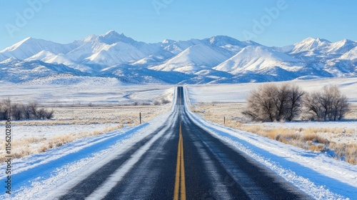Wallpaper Mural A steep road ascending into snow-dusted mountain peaks, crisp winter air  Torontodigital.ca