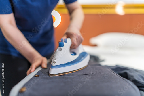 Modern Home Care: Efficient Ironing Technique for Crisp, Clean Clothes photo