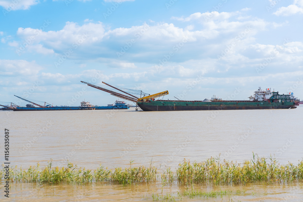 Natural Scenery of Yangtze River Port and mudflat in Suzhou, Jiangsu Province, China on August 20, 2024 Natural Scenery of Yangtze River Port and mudflat in Suzhou, Jiangsu Province, China on August 20, 2024