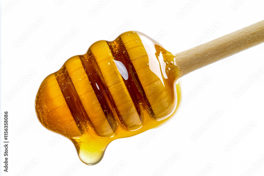 Dripping honey, close-up, isolated on white background with clipping path.