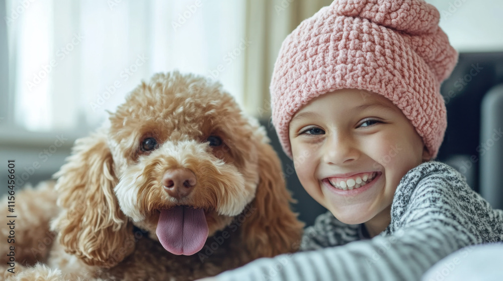Happy child in knitted pink hat sits beside fluffy dog, both smiling warmly while enjoying indoor playtime in a cozy, sunlit living room atmosphere. Happy child in knitted pink hat sits beside fluffy dog, both smiling warmly while enjoying indoor playtime in a cozy, sunlit living room atmosphere.