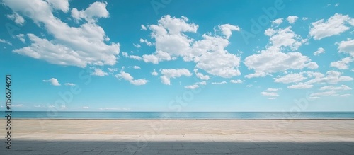 Scenic Open Road Leading to Horizon Under Bright Blue Sky with Fluffy Clouds Ideal for Inspirational Text or Journey Themes photo