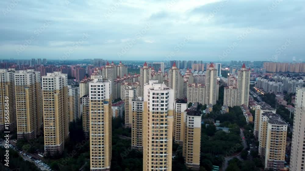Explore aerial views of urban real estate showcasing modern structures and cityscape in daylight hours Explore aerial views of urban real estate showcasing modern structures and cityscape in daylight hours