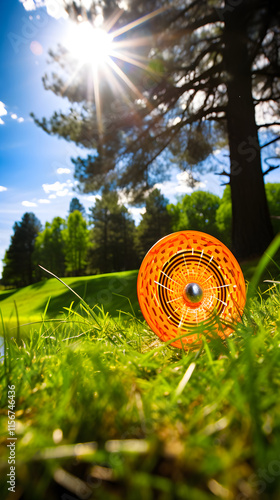 Dynamic Mid-Flight Scene of a DD Disc Golf Game in a Lush Green Course With Intense Spectator Anticipation photo