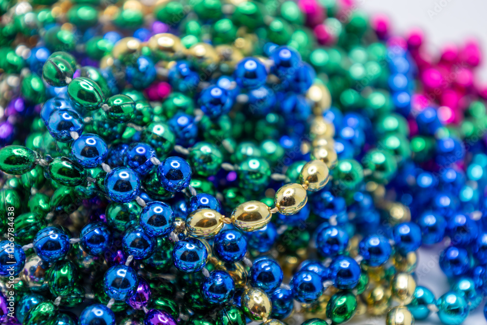 Full frame macro texture background of multi colored defocused Mardi Gras bead necklaces
Full frame macro texture background of multi colored defocused Mardi Gras bead necklaces