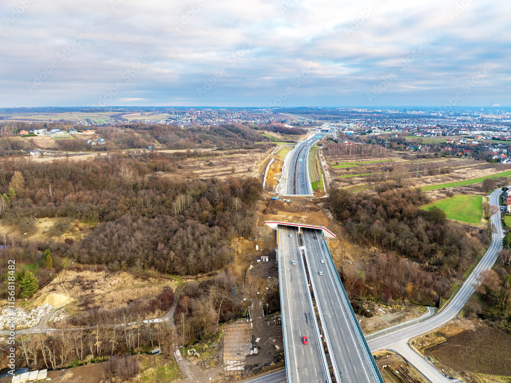 New S52 highway, part of ring road around Krakow, Poland, opened for traffic on December 23, 2024. A green bridge for wild life migration. Aerial view