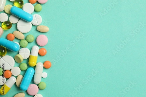 Various pills on a colored background