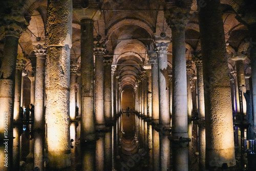 Canvas Print Ancient Basilica Cistern in Istanbul with illuminated columns and arches reflect