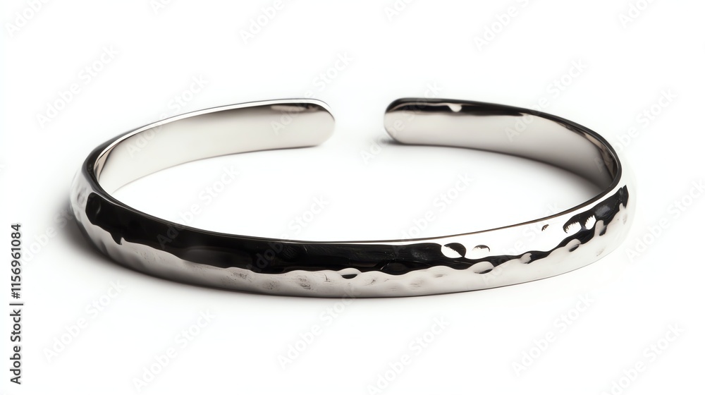 Elegant silver cuff bracelet with a textured surface, perfect for modern accessories. Elegant silver cuff bracelet with a textured surface, perfect for modern accessories.
