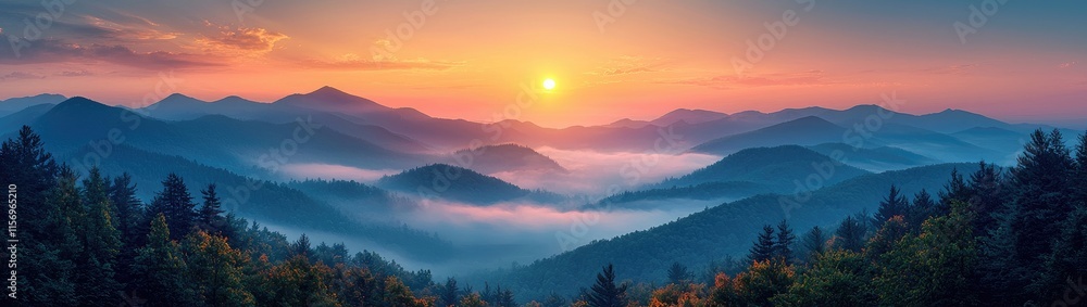 Obraz premium Golden Sunrise Over Misty Mountains: Serenity in Nature