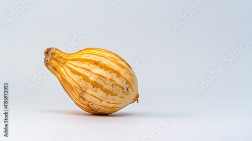 Close-up of a fresh vegetable lying on a pure white background. Simple yet vivid display of the vegetable's details, showing its texture and unique shape clearly, a great visual for food related topic photo