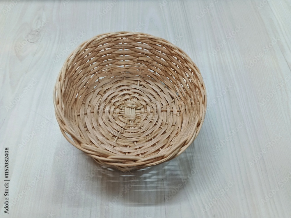 Fototapeta premium wicker basket on wooden background