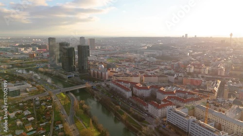 Wallpaper Mural Vienna, Austria Aerial View: Sunset Over City Center and Canal. Top cinematic aerial view. 4K drone footage Torontodigital.ca