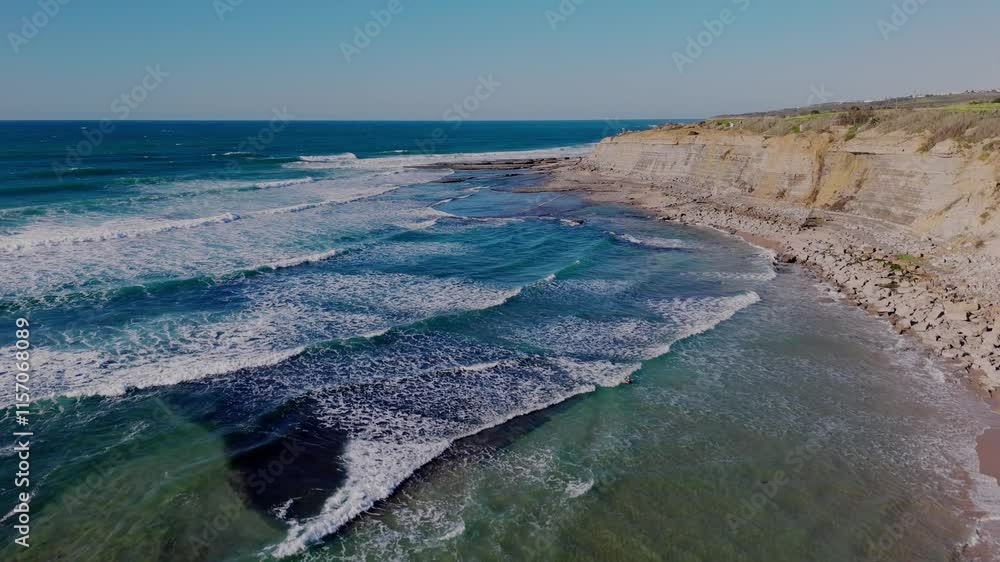 Aerial view of the sandy beach of Ericeira, Portugal. Aerial view of the sandy beach of Ericeira, Portugal.