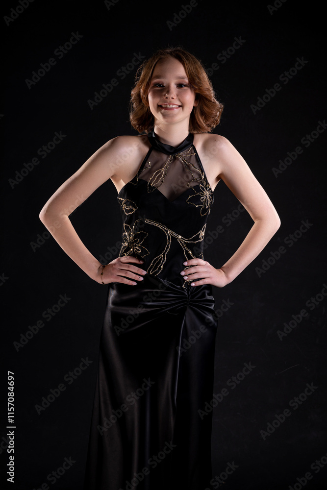 An Elegant Model in a Stunning Black Evening Gown at a Glamorous HighProfile Event An Elegant Model in a Stunning Black Evening Gown at a Glamorous HighProfile Event