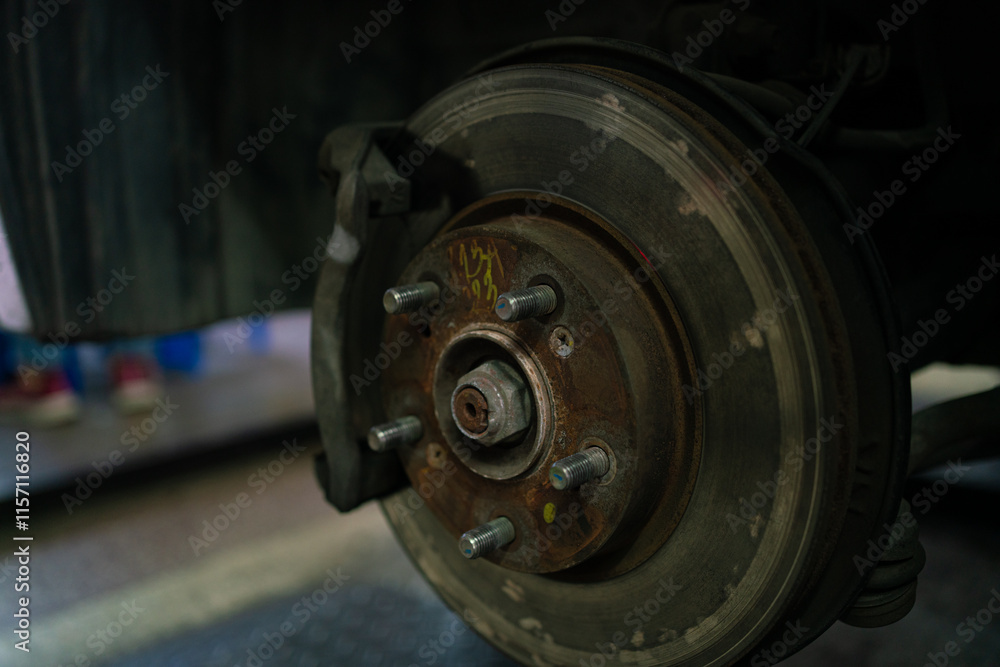 Mechanical man maintenance car brake and fix in tire shop Mechanical man maintenance car brake and fix in tire shop