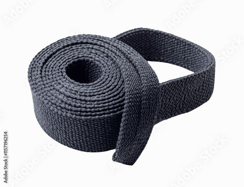 A yoga strap rolled up or folded, isolated on a white background, showcasing its texture and fitness usage