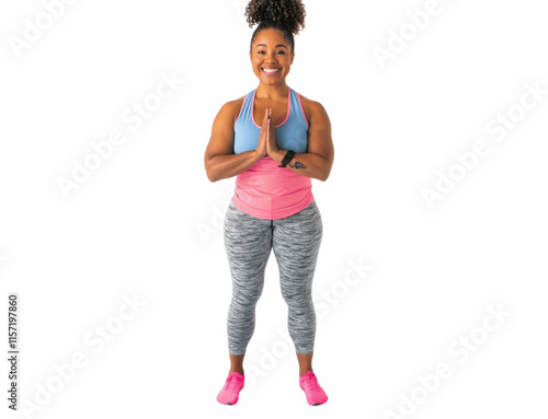 A fitness instructor in athletic wear, holding a yoga mat, standing and smiling, facing forward, centered on a white background for a welcoming look photo