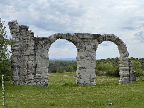 Remains of the arches of the basilica of the Roman military camp Burnum - Krka National Park, Croatia (Ostaci lukova bazilike rimskog vojnog logora Burnuma, Ivoševci - Nacionalni park Krka, Hrvatska) photo