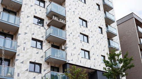 Wallpaper Mural Multi-Story Apartment Building with Balconies and Geometric Facade Torontodigital.ca