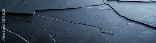 Abstract close-up of dark slate surface with natural fissures and texture, perfect for backgrounds, presentations, or graphic design projects, providing a modern and elegant visual photo