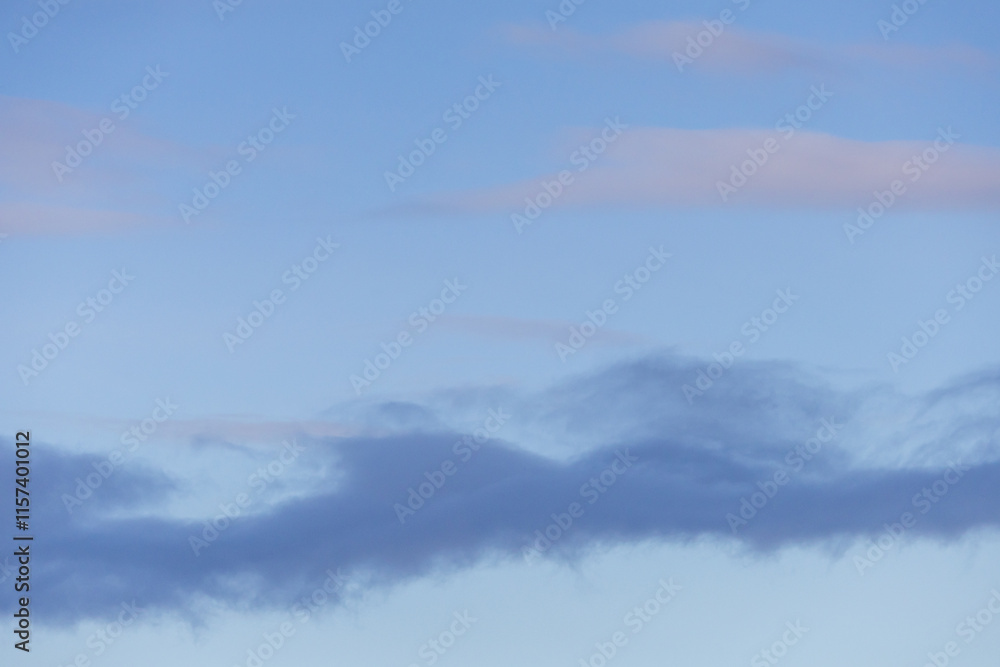 Naklejka premium Serene Sky with Soft Clouds During Sunset Over BC, Canada