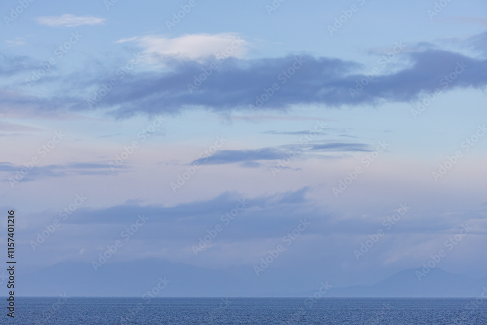 Serene View of Calm Ocean Under a Vibrant Cloudy Sky Serene View of Calm Ocean Under a Vibrant Cloudy Sky