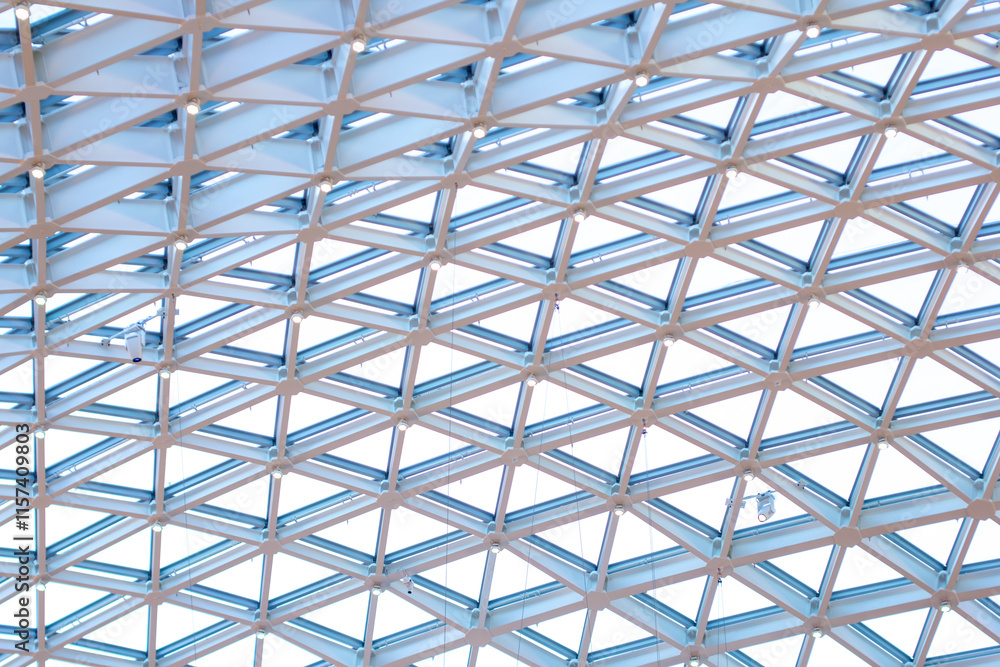 Fototapeta premium a metal structure with a blue background with a white design.