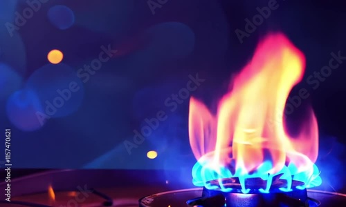  Blue gas flame on a kitchen stove, symbolizing rising gas prices photo