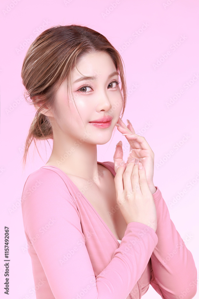 Portrait of a Smiling Asian Woman fresh skin in Stylish Pink Attire Against a Soft Background. Portrait of a Smiling Asian Woman fresh skin in Stylish Pink Attire Against a Soft Background.