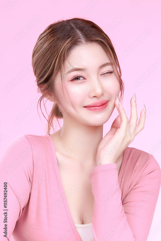 Portrait of a Smiling Asian Woman fresh skin in Stylish Pink Attire Against a Soft Background. Portrait of a Smiling Asian Woman fresh skin in Stylish Pink Attire Against a Soft Background.