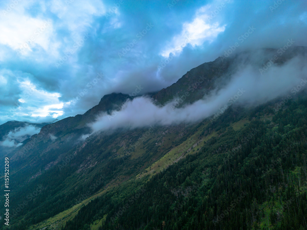 Mountains in the clouds. Low clouds in the North Caucasus mountains Mountains in the clouds. Low clouds in the North Caucasus mountains