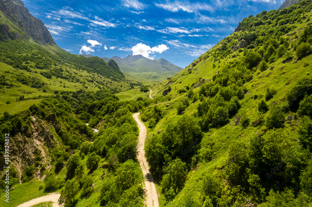 Naklejka premium Beautiful aerial view of a mountain road. Landscape and nature of the North Caucasus