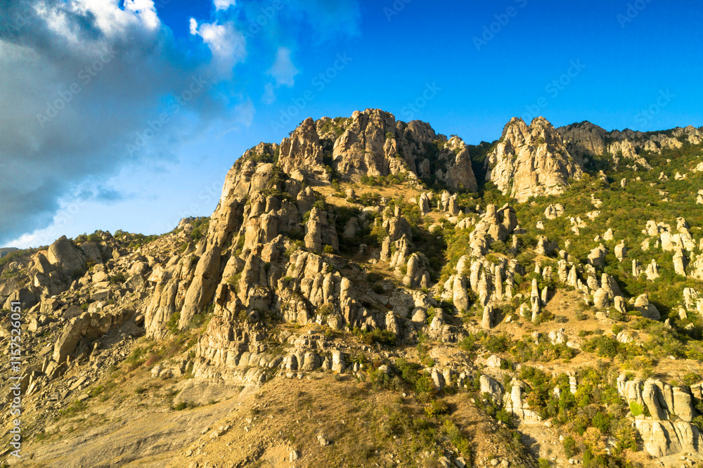 Beautiful aerial view of a mountain range with high cliffs. Landscape and nature of the North Caucasus Beautiful aerial view of a mountain range with high cliffs. Landscape and nature of the North Caucasus