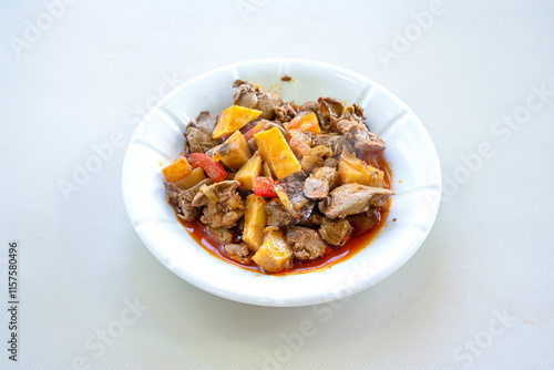 Famous Urfa meat liver, ciger wrapped by lavash with roasted chili pepper, onion and sauce in Sanliurfa, Turkey. Kuzu et ciger sis. Izgara dana bonfile, cop sis, kuzu pirzola. Karisik kebap, beyti keb photo