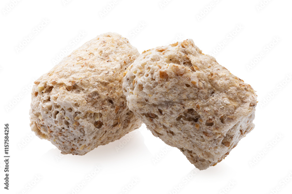 Two wheat bran granules isolated on white background, objects completely sharp Two wheat bran granules isolated on white background, objects completely sharp