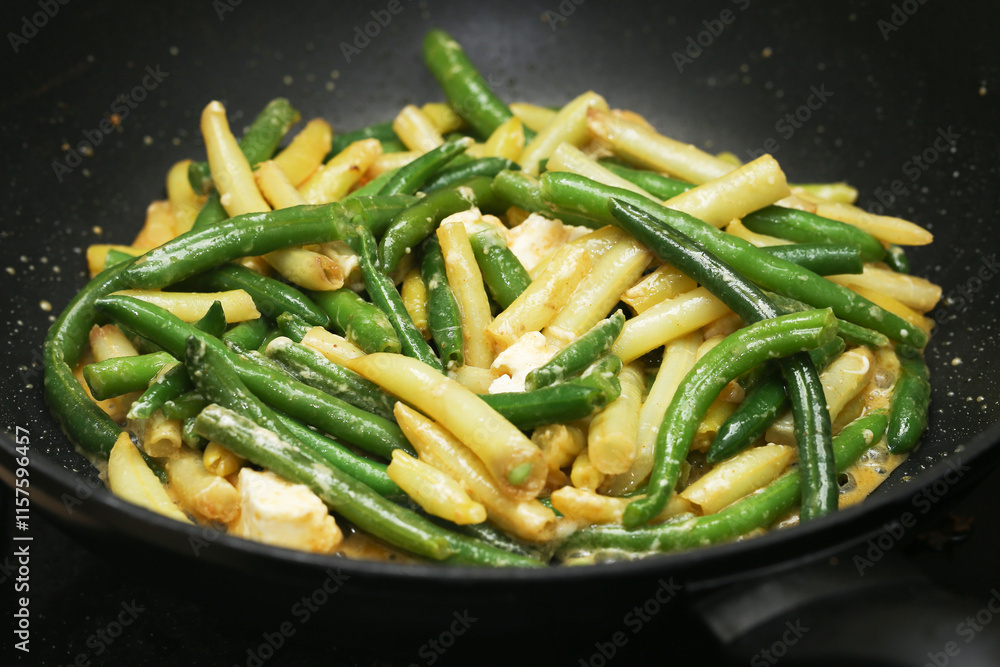 Fried yellow and green beans with olive oil and feta cheese. Shiny vegetables with rich flavor. Healthy and affordable dish idea. Perfect for a nutritious and delicious meal. Food lover paradise. Fried yellow and green beans with olive oil and feta cheese. Shiny vegetables with rich flavor. Healthy and affordable dish idea. Perfect for a nutritious and delicious meal. Food lover paradise.