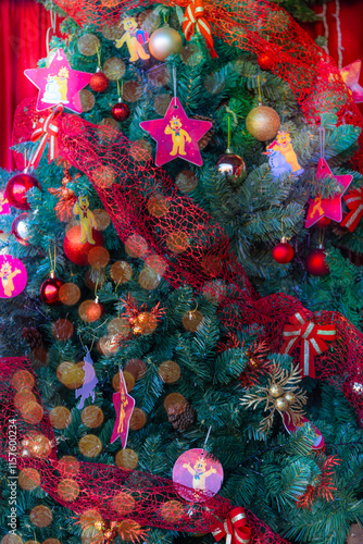 Christmas tree decorated with christmas balls and festive ornaments