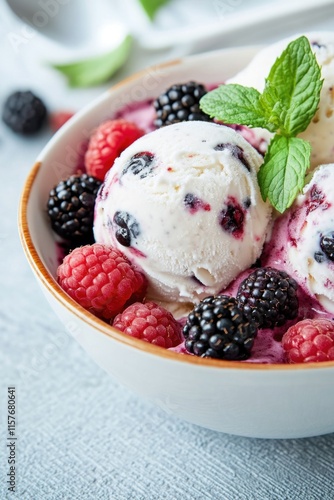 Wallpaper Mural A delicious bowl of ice cream topped with mixed berries and fresh mint leaves, perfect for a sweet treat or as a prop in food photography Torontodigital.ca