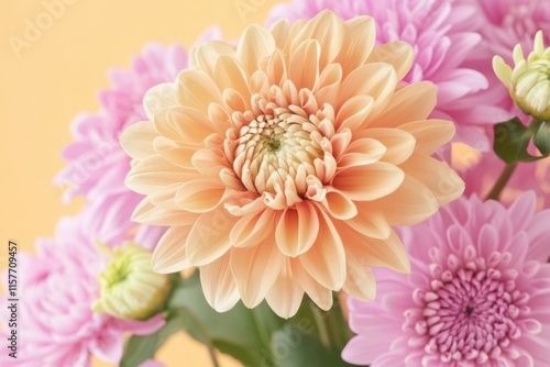A bouquet of flowers with a yellow flower in the middle