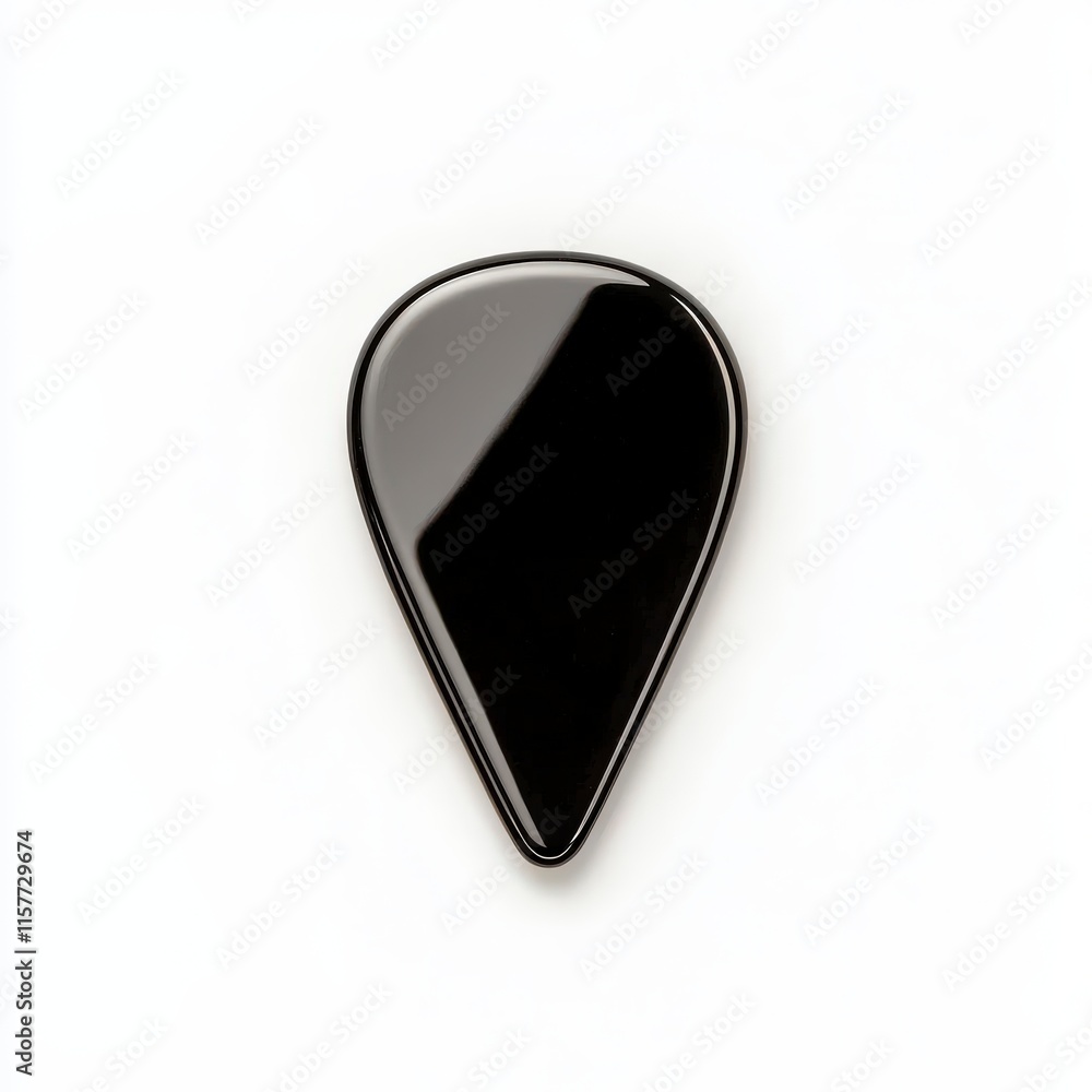 Obraz premium A close up of a black guitar pick perfect for music-themed designs. isolated on white background