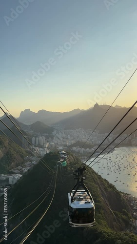 Sunset view of the cable car going to the Sugar loaf mountain, Rio de Janeiro, Brazil