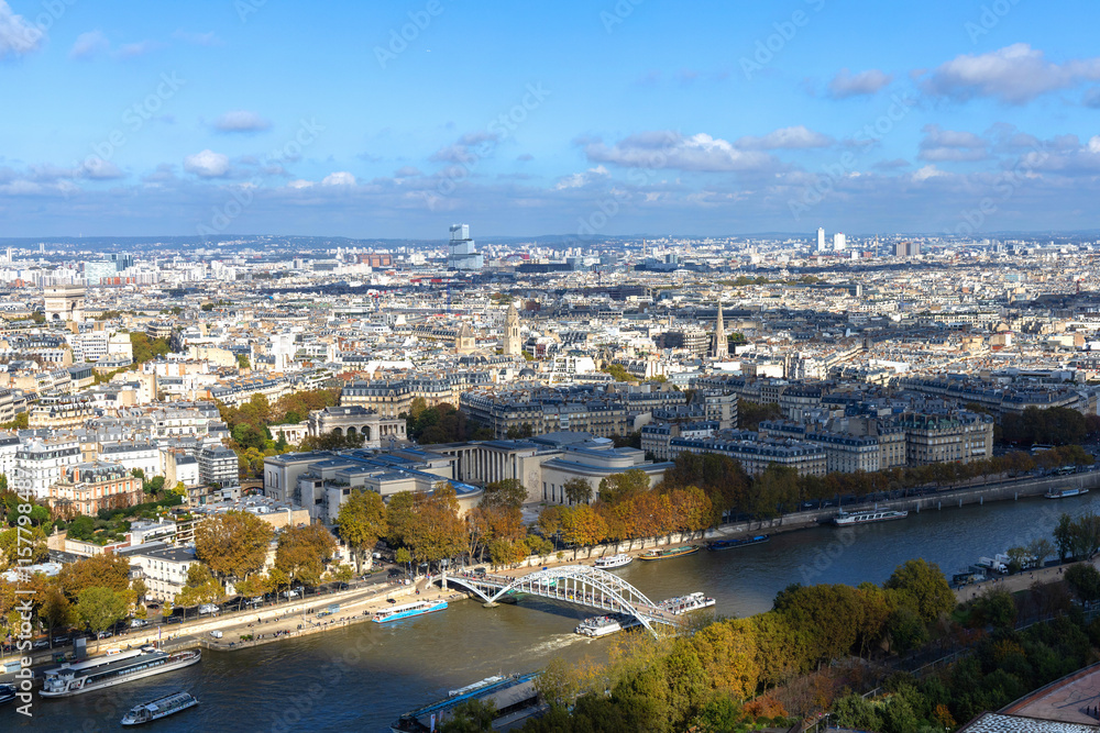 Aerial View of Paris highlighting the Seine River and the stunning cityscape of the metropolis Aerial View of Paris highlighting the Seine River and the stunning cityscape of the metropolis