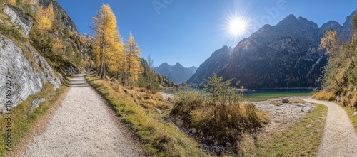 A tranquil autumn landscape with the majestic Alps in the background, captured at Reiteralm, Steiermark, Austria photo