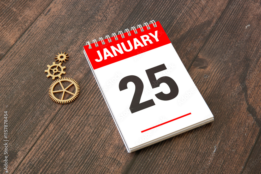 25 January calendar table with blurred nature background.